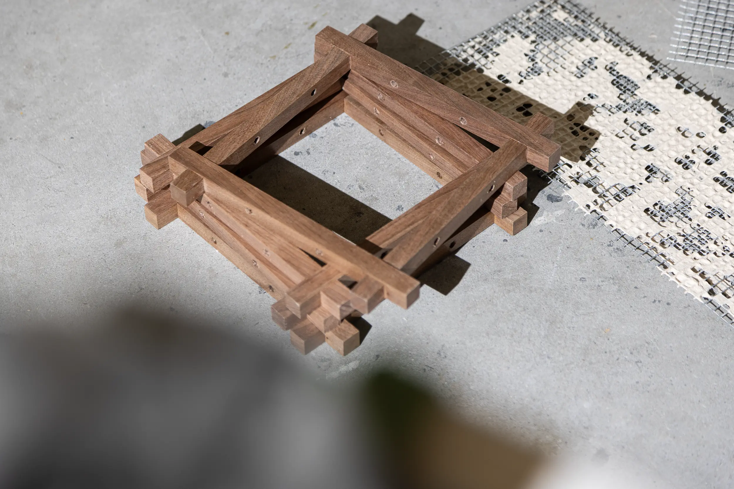 Full Moon Ride Table Lamp - Inspired by the iconic chrome finishes of the Mid Century era. Features a meticulously crafted grid pattern accentuating its geometric harmony. Conceptually alluring and transcending boundaries of conventional lighting.