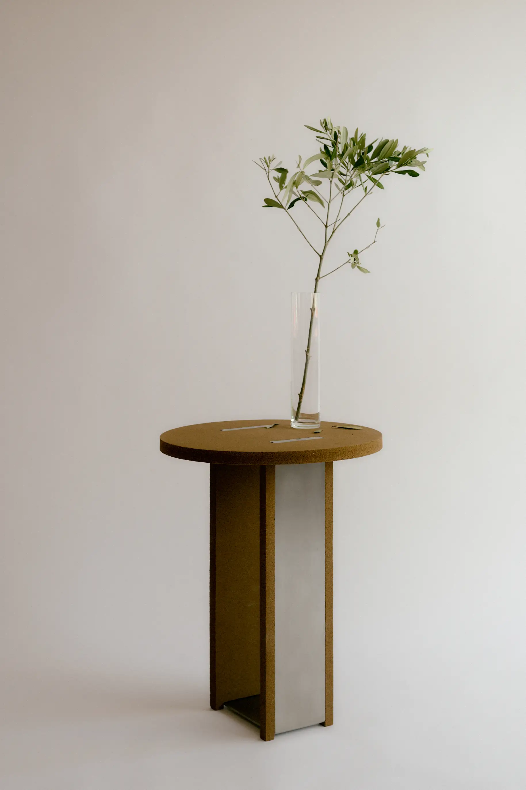 Front perspective view of olive pit composite design object, showcasing circular material sourcing and vernacular knowledge in Portugal